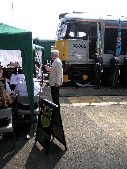 The band plays as guests gather in the depot yard